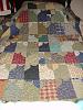 Click image for larger version

Name:	homespun cat quilt.jpg
Views:	370
Size:	71.9 KB
ID:	321456