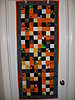 Click image for larger version

Name:	totally scrappy halloween tablerunner#1--L-E--finished 72012.JPG
Views:	4148
Size:	115.2 KB
ID:	346951