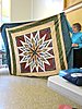 Click image for larger version

Name:	feathered star shown at quilt guild 1.jpg
Views:	608
Size:	1.59 MB
ID:	421125