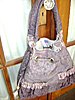 Click image for larger version

Name:	PURPLE GROMET PURSE 001.JPG
Views:	1093
Size:	178.1 KB
ID:	442643