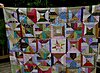 Click image for larger version

Name:	A scrappy quilt with a star.jpg
Views:	1057
Size:	89.1 KB
ID:	527105
