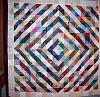 Click image for larger version

Name:	Bulls eye HST quilt.jpg
Views:	4035
Size:	39.5 KB
ID:	301560