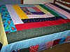 Click image for larger version

Name:	scrappy side quilt makeover.jpg
Views:	8772
Size:	1.83 MB
ID:	348838