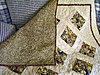 Click image for larger version

Name:	Do's quilt showing back.jpg
Views:	11911
Size:	1.02 MB
ID:	381984