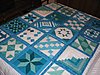 Click image for larger version

Name:	Turquoise and white quilt blocks_framed.jpg
Views:	600
Size:	188.0 KB
ID:	402618