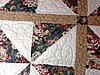 Click image for larger version

Name:	Floral Pinwheel big stitch closeup.jpg
Views:	290
Size:	57.5 KB
ID:	440471
