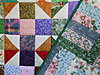 Click image for larger version

Name:	Quilt and Backing.JPG
Views:	1935
Size:	330.6 KB
ID:	526817