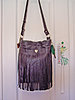 Click image for larger version

Name:	Purse black leather with fringe front 1.jpg
Views:	1267
Size:	528.3 KB
ID:	561264