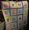 Click image for larger version

Name:	Baby Clothes Quilt I made.JPG
Views:	2040
Size:	397.4 KB
ID:	567346