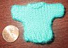 Click image for larger version

Name:	tiny teal sweater is smallest i ever knit  sm.JPG
Views:	405
Size:	54.4 KB
ID:	586221