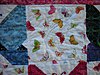 cindy7s-quilt-front-close-up-hand-quilting-2.jpg