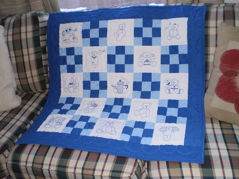 how to make a quilt with embroidered squares