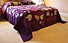 lucias-quilt-bed-resized.jpg